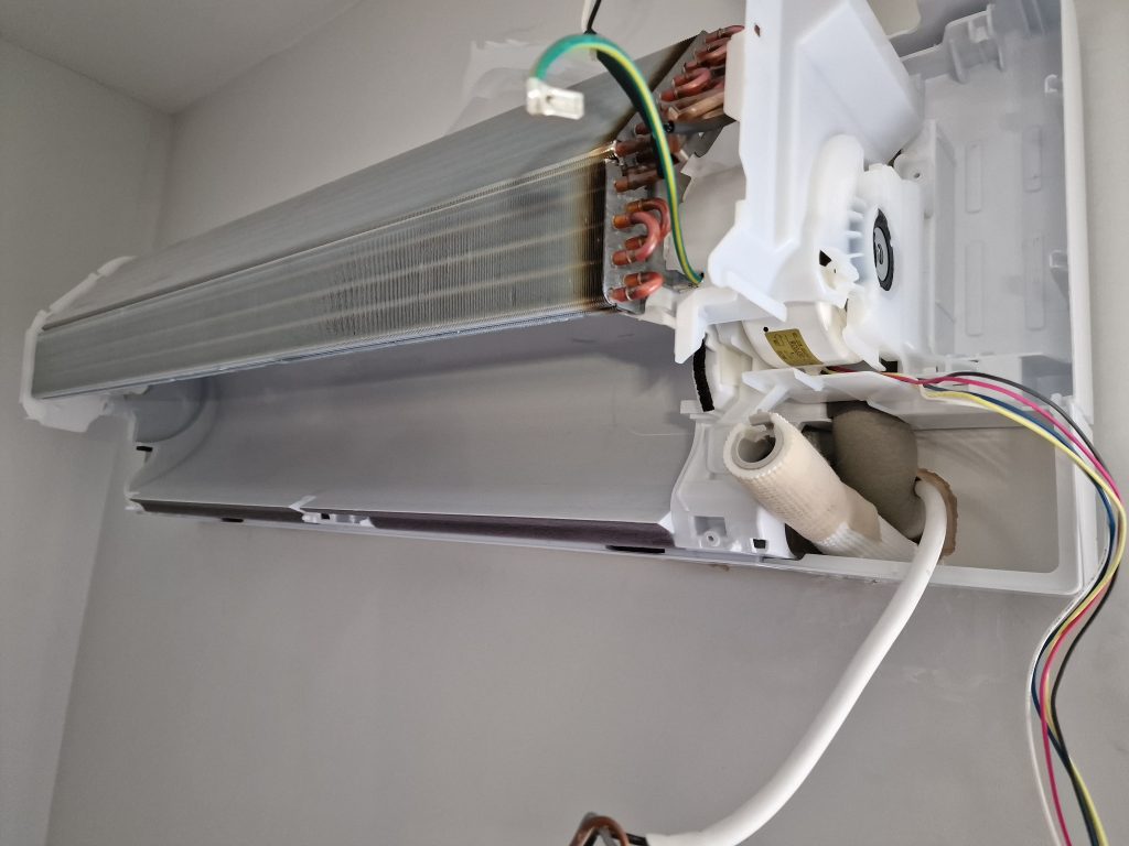 Indoor air conditioning unit with its casing open
